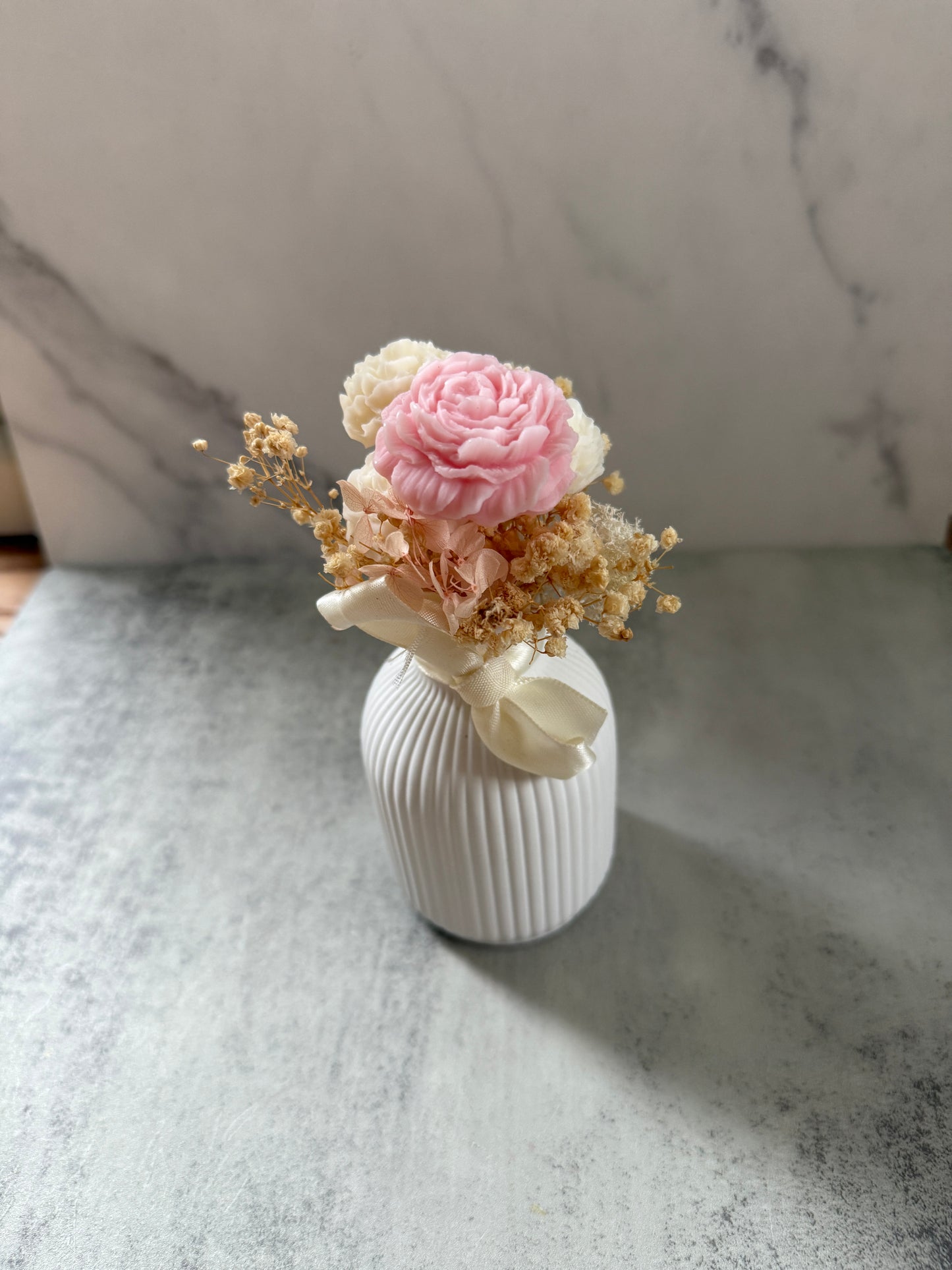 Forever Flowers in a self-cast container