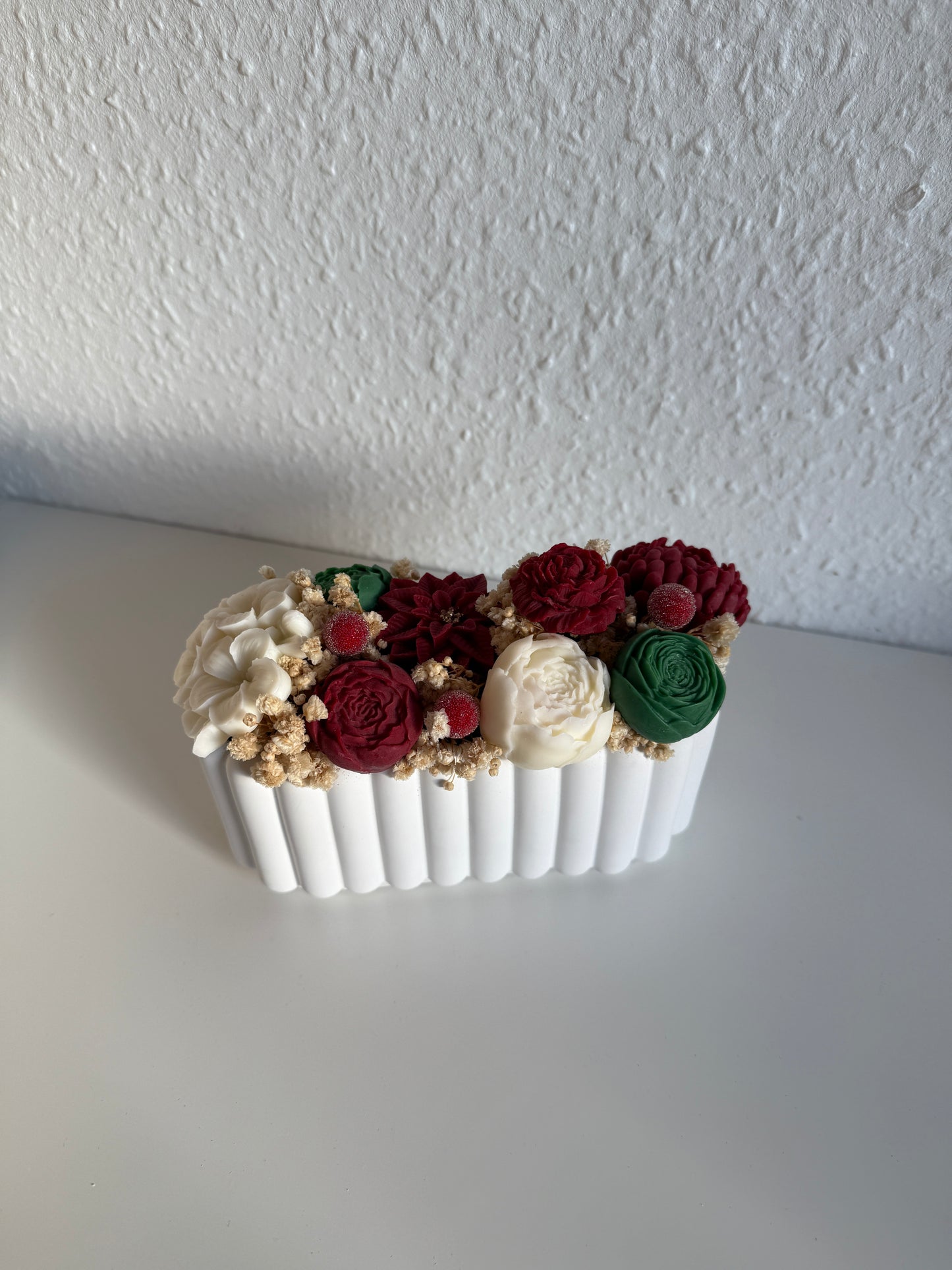 Weihnachtsstrauß in selbstgegossenem Gefäß