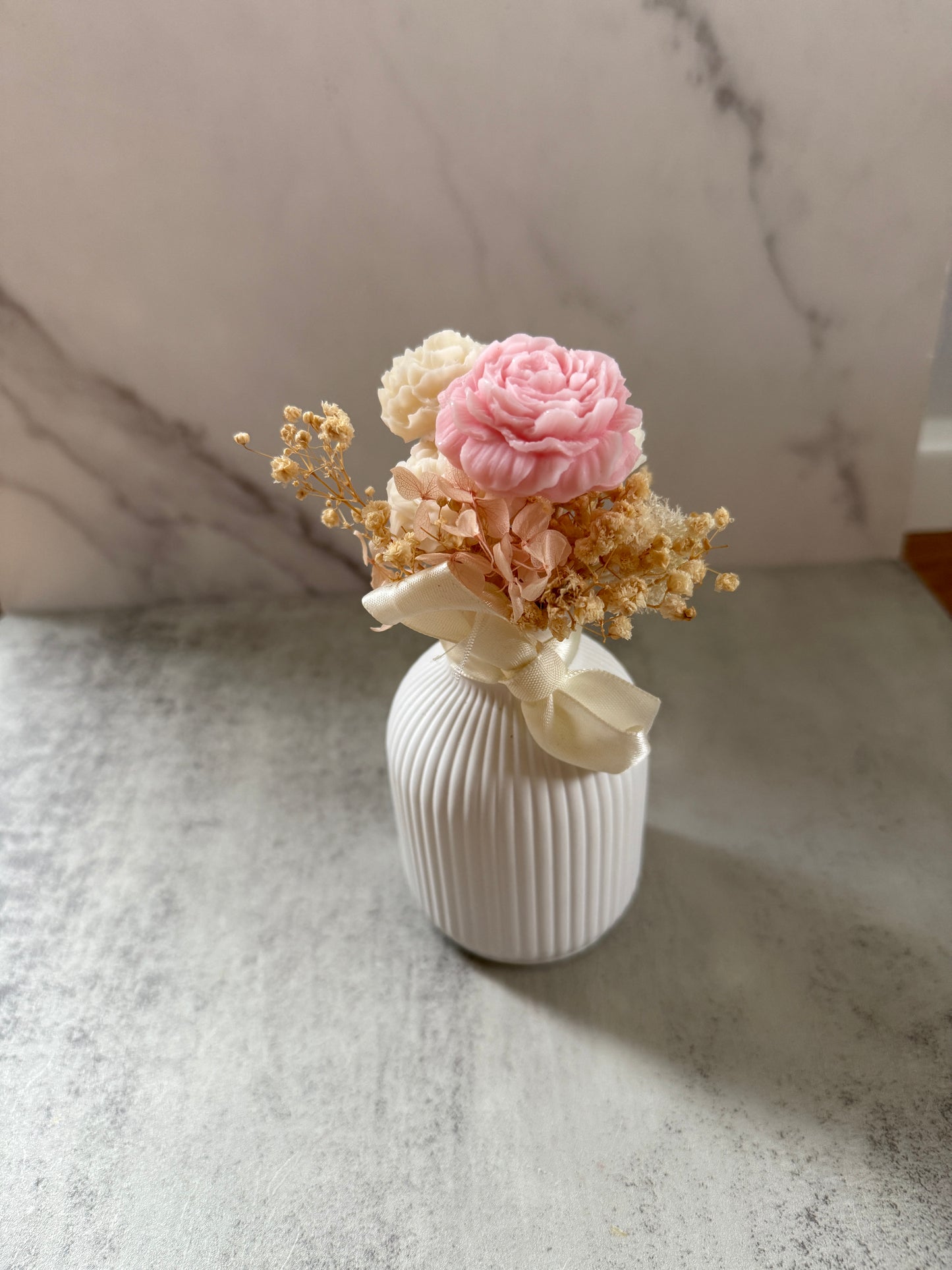 Forever Flowers in a self-cast container