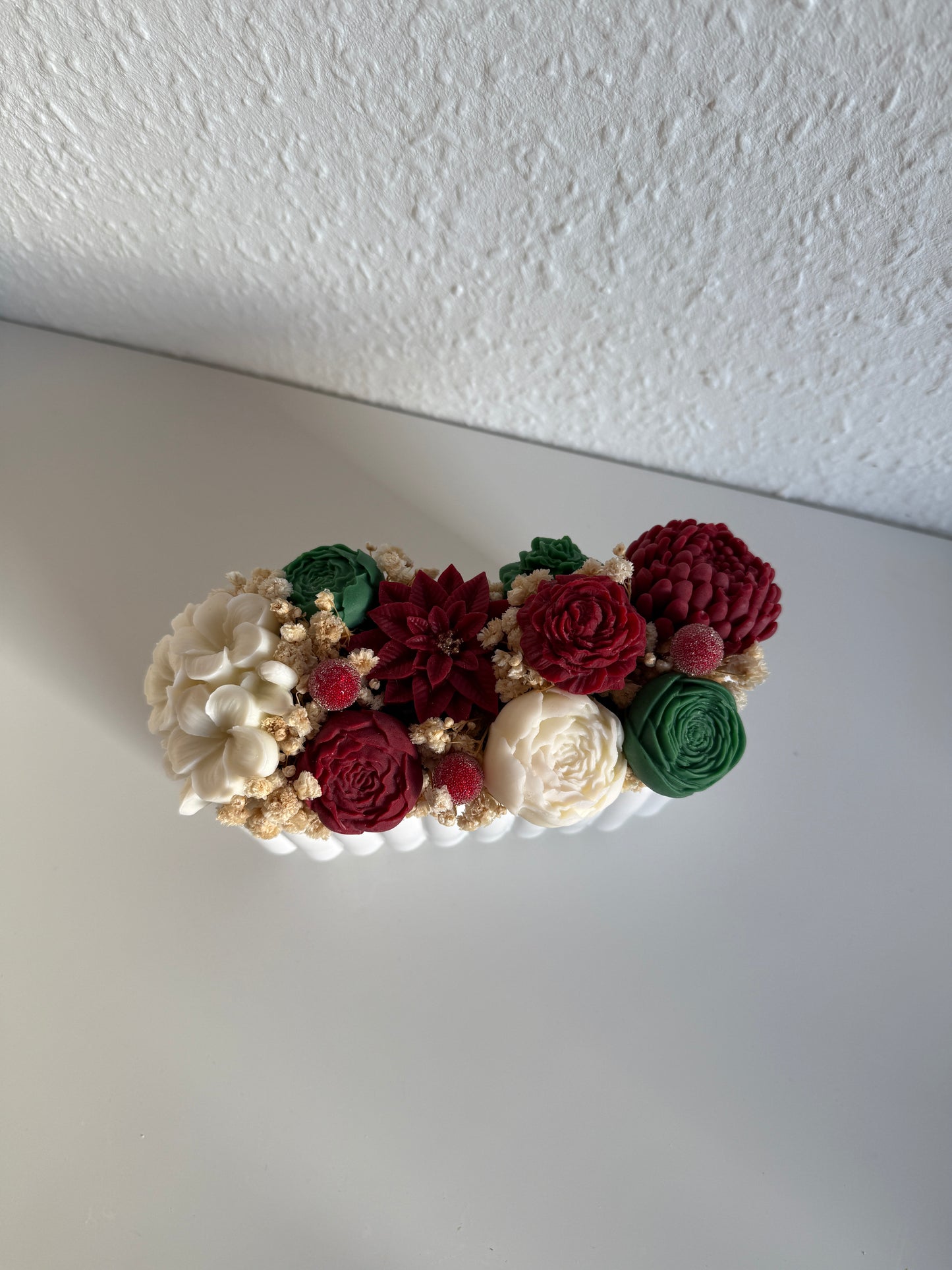 Weihnachtsstrauß in selbstgegossenem Gefäß